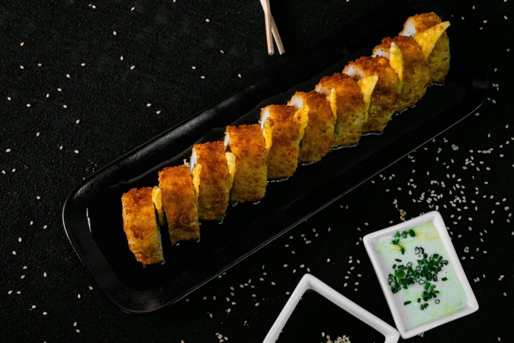 pexels-photo-12706240-12706240 Sushi Rolls in Elongated Black Plate